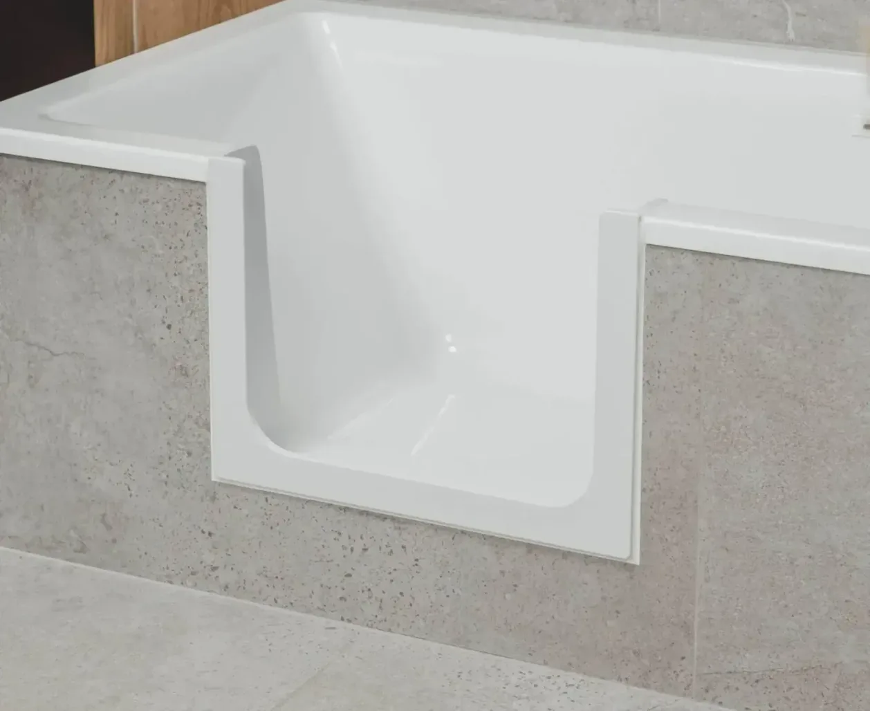 The open UDOOR® step-in frame cut into the side of the bath